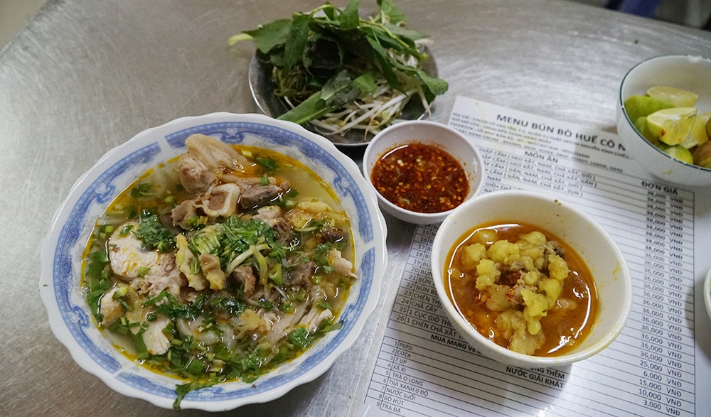 This eatery serves beef noodle soup with a distinctive layer of floating fat, rich broth, and quality sausages